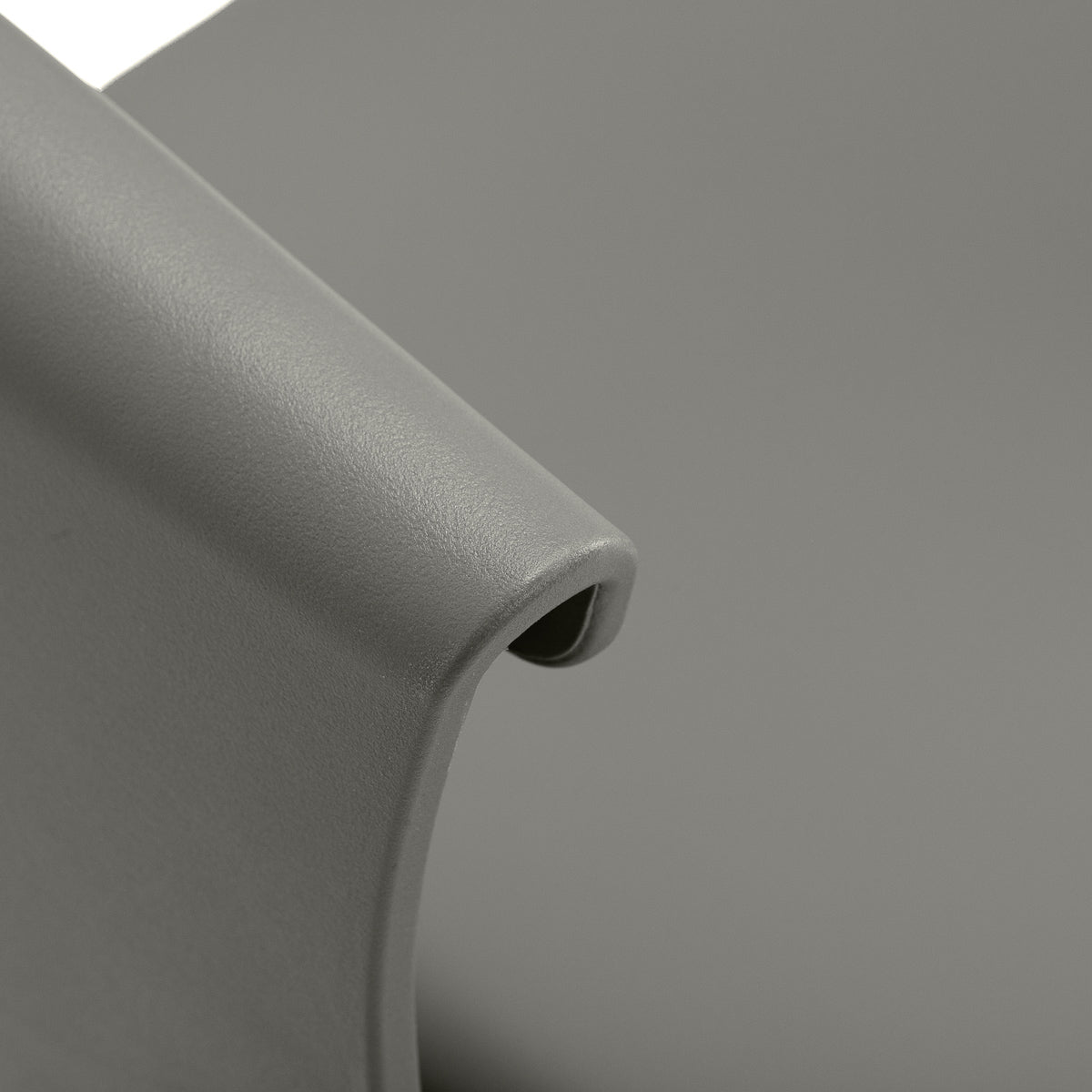 Gray Halo hairdressing chair by HAIR SYSTEM with padded seat and backrest, adjustable height, and modern salon design.