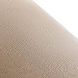 Omega Astra Plus beige hairdressing chair with adjustable headrest and armrests, featuring a sleek modern design.