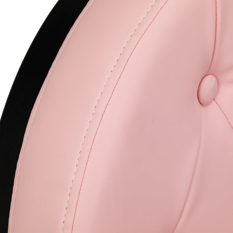 Pink barber chair by GABBIANO with black base, featuring plush cushioning and adjustable armrests for professional salon styling.