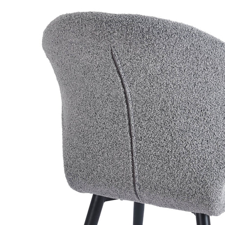 Close-up of soft grey sherpa upholstery on 4RICO Lucente chair