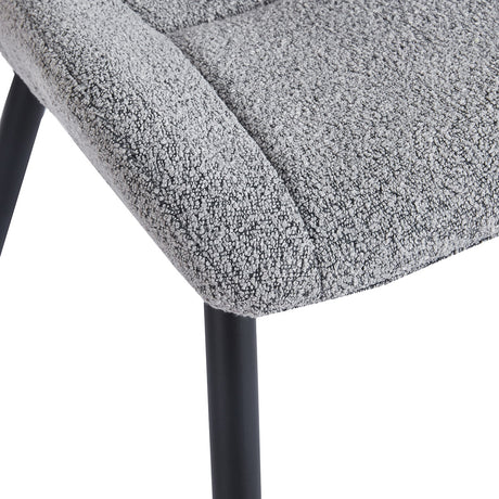 Black metal leg detail on 4RICO Lucente grey upholstered chair