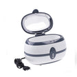 Professional Ultrasonic Cleaner VGT-800 by Beauty System with 600ml capacity, shown with stainless steel cleaning basket inside.