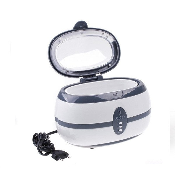 Professional Ultrasonic Cleaner VGT-800 by Beauty System with 600ml capacity, shown with stainless steel cleaning basket inside.