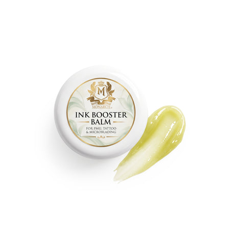 Skin Monarch Ink Booster Balm 30ml, tampa junto a uma amostra de bálsamo amarelo brilhante
