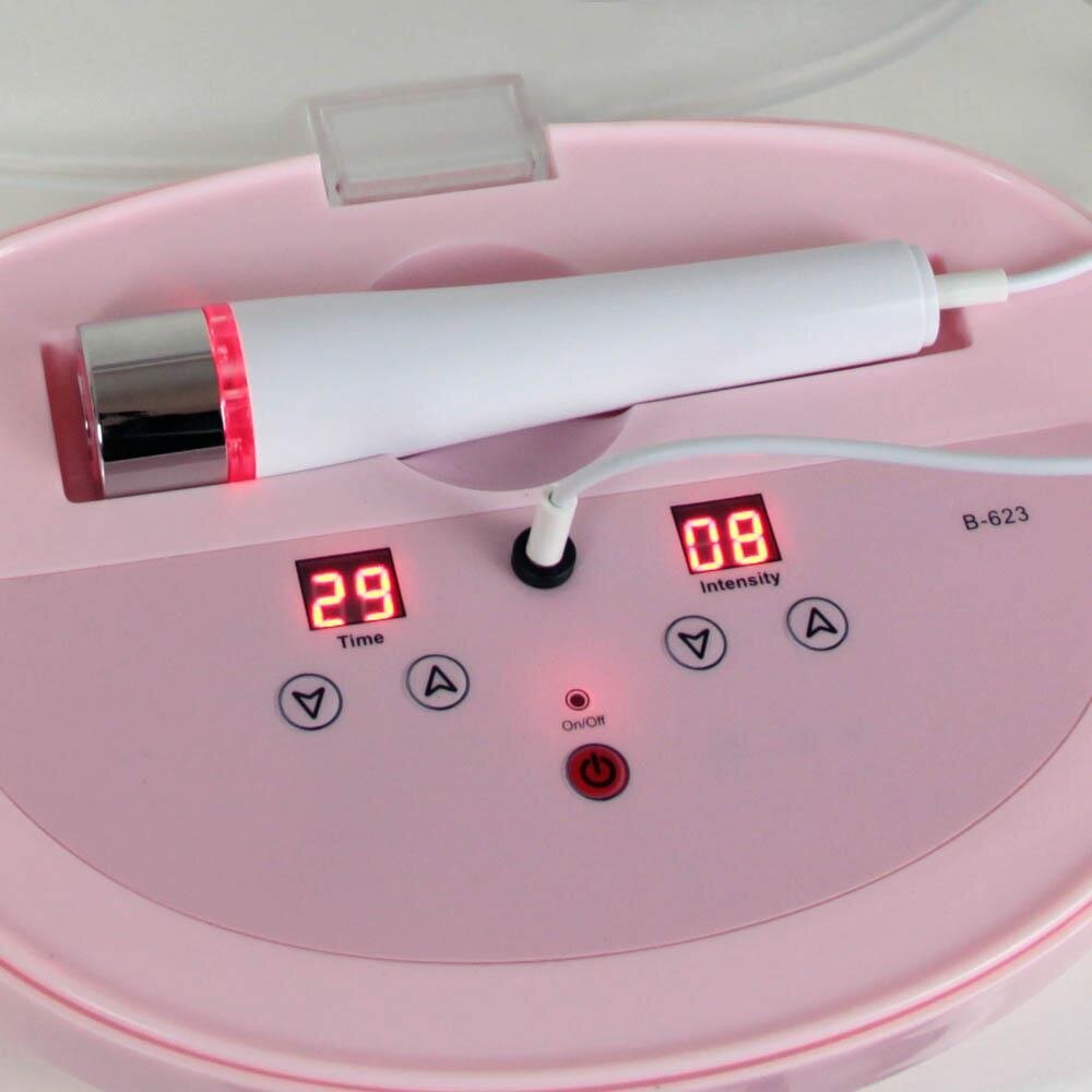 Pink Mini RF Radio Frequency device from Beauty System, showing the compact design and control panel.