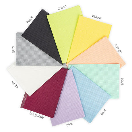 Absorbent cellulose workstation pad with waterproof backing