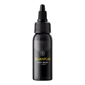 Quantum Tattoo Gray Wash Light Pigments 120ml bottle, showing the gray ink pigment for tattooing, with a focus on the product label.